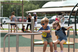two children sitting on merry-go-round
