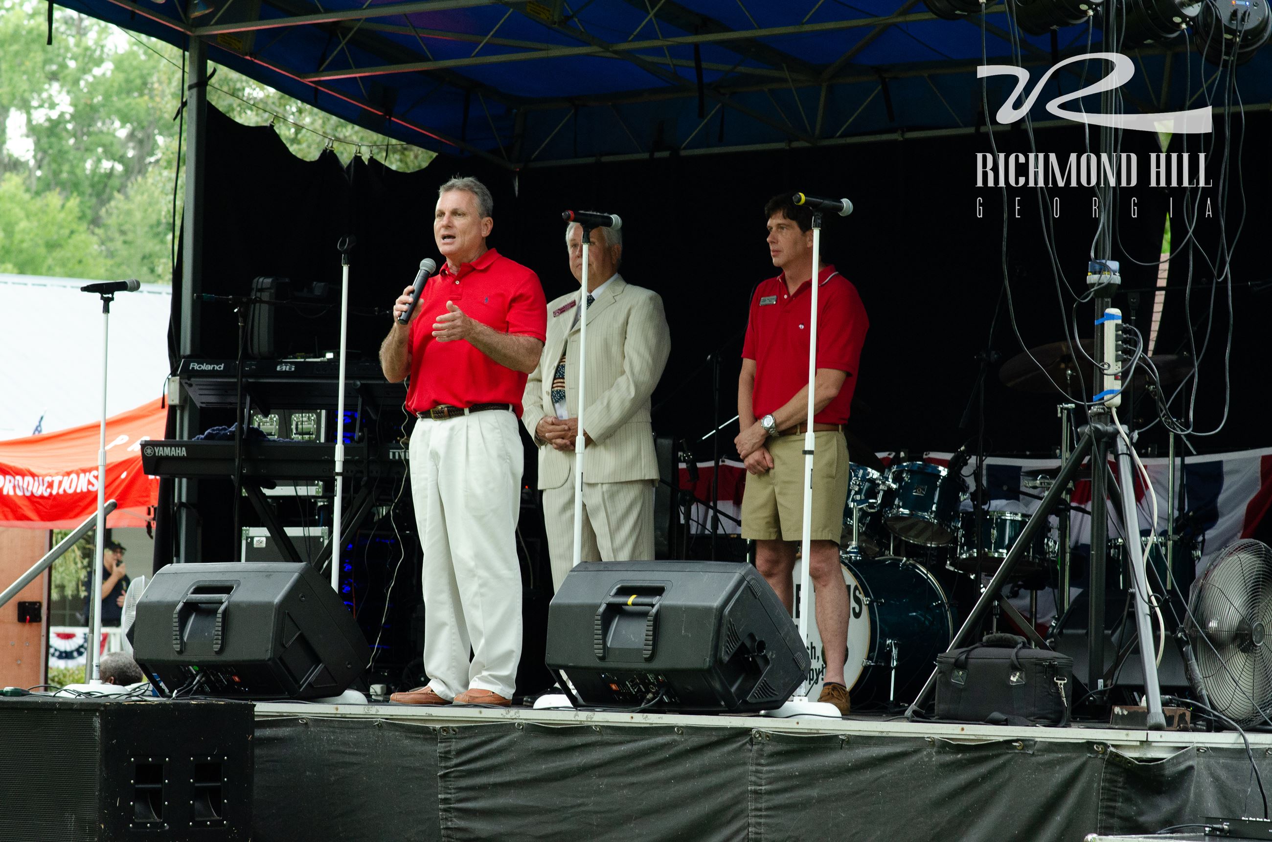 Richmond Hill City Council standing on a stage